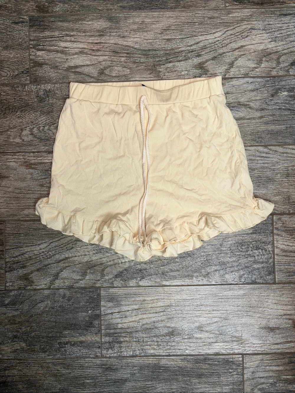 Ruffled Drawstring Pull On Lounge Shorts in Pale Yellow
